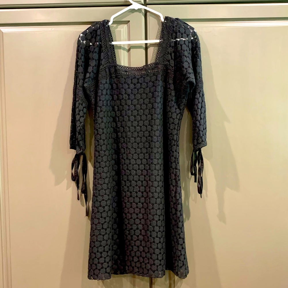 Solitaire women’s black dress - size medium.